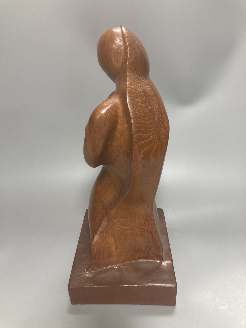 After Henry Moore, two related figural sculptures in wood and plaster, 31cm, white composition, 28cm